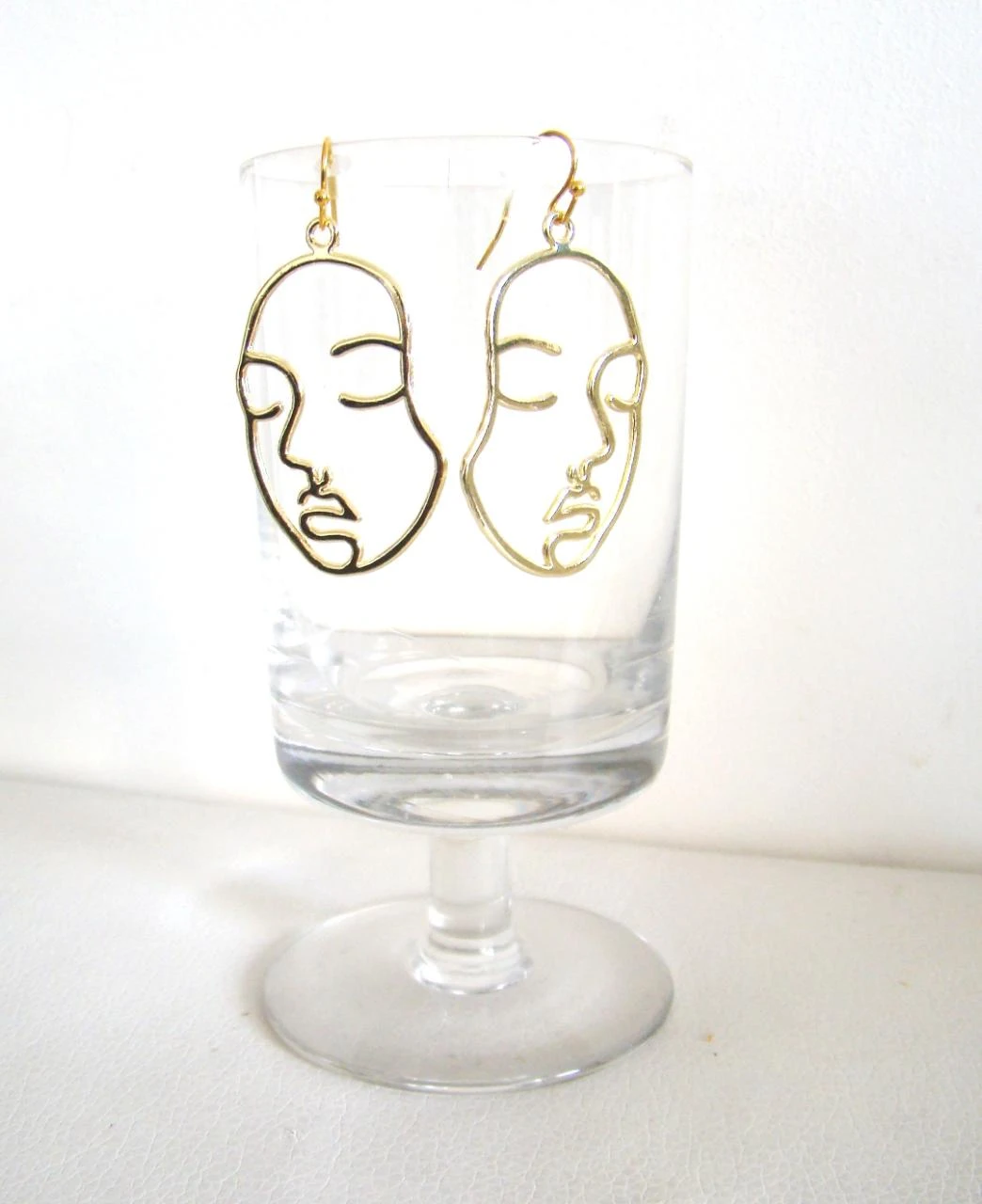 Boucles visage femme dorées jamais portées création